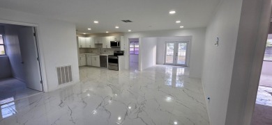 Step into luxury! This fully remodeled 4-bed, 2-bath stunner on Forest Oaks Golf Club in Florida - for sale on GolfHomes.com, golf home, golf lot