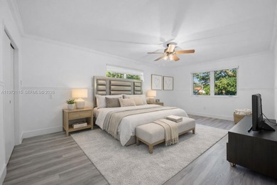 Refined two-story residence in North Coral Gables, set along a on Granada Golf Club in Florida - for sale on GolfHomes.com, golf home, golf lot