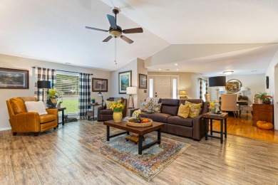 Surrounded by mature trees on a peaceful lot, this home blends on The Coves Golf Course in Oklahoma - for sale on GolfHomes.com, golf home, golf lot