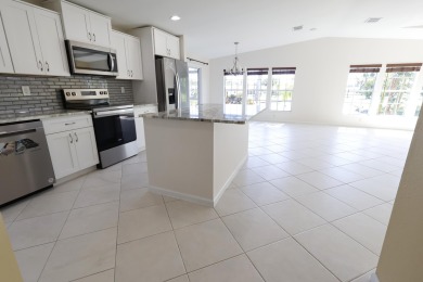Absolutely stunning and one-of-a-kind corner lot with wraparound on Savanna Golf Club in Florida - for sale on GolfHomes.com, golf home, golf lot