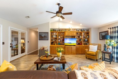 Surrounded by mature trees on a peaceful lot, this home blends on The Coves Golf Course in Oklahoma - for sale on GolfHomes.com, golf home, golf lot