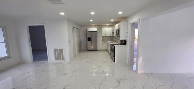 Step into luxury! This fully remodeled 4-bed, 2-bath stunner on Forest Oaks Golf Club in Florida - for sale on GolfHomes.com, golf home, golf lot