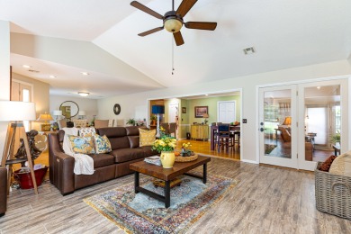 Surrounded by mature trees on a peaceful lot, this home blends on The Coves Golf Course in Oklahoma - for sale on GolfHomes.com, golf home, golf lot