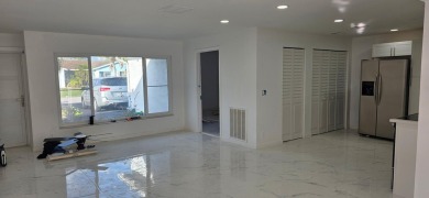 Step into luxury! This fully remodeled 4-bed, 2-bath stunner on Forest Oaks Golf Club in Florida - for sale on GolfHomes.com, golf home, golf lot