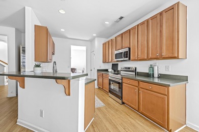 Welcome to 4816 W Red Maple Circle, where modern elegance meets on Golf Club At Wescott Plantation in South Carolina - for sale on GolfHomes.com, golf home, golf lot