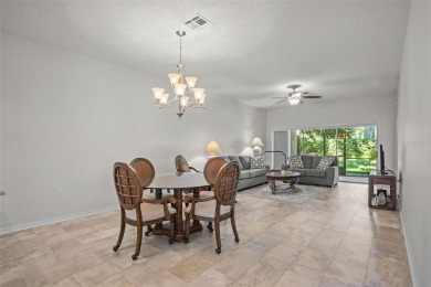 Welcome to this FULLY FURNISHED, END UNIT meticulously on Cypresswood Golf and Country Club in Florida - for sale on GolfHomes.com, golf home, golf lot