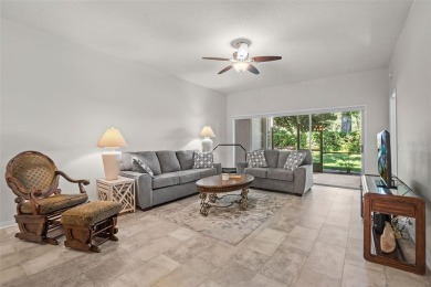 Welcome to this FULLY FURNISHED, END UNIT meticulously on Cypresswood Golf and Country Club in Florida - for sale on GolfHomes.com, golf home, golf lot