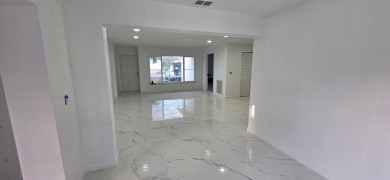 Step into luxury! This fully remodeled 4-bed, 2-bath stunner on Forest Oaks Golf Club in Florida - for sale on GolfHomes.com, golf home, golf lot