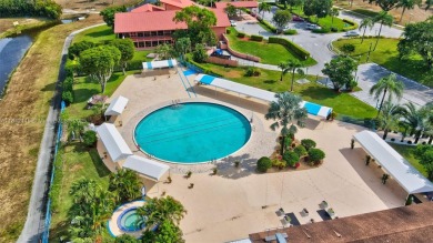 Wonderful 1st floor corner unit with parking right in front for on Villa Del Ray Golf Club in Florida - for sale on GolfHomes.com, golf home, golf lot