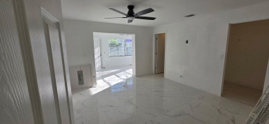 Step into luxury! This fully remodeled 4-bed, 2-bath stunner on Forest Oaks Golf Club in Florida - for sale on GolfHomes.com, golf home, golf lot