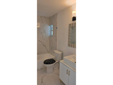 Step into luxury! This fully remodeled 4-bed, 2-bath stunner on Forest Oaks Golf Club in Florida - for sale on GolfHomes.com, golf home, golf lot