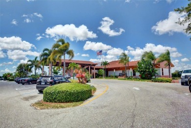Wonderful 1st floor corner unit with parking right in front for on Villa Del Ray Golf Club in Florida - for sale on GolfHomes.com, golf home, golf lot