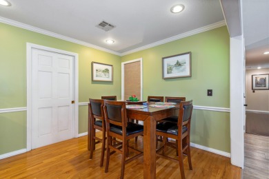 Surrounded by mature trees on a peaceful lot, this home blends on The Coves Golf Course in Oklahoma - for sale on GolfHomes.com, golf home, golf lot
