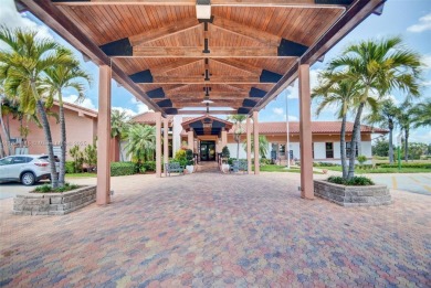 Wonderful 1st floor corner unit with parking right in front for on Villa Del Ray Golf Club in Florida - for sale on GolfHomes.com, golf home, golf lot