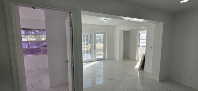 Step into luxury! This fully remodeled 4-bed, 2-bath stunner on Forest Oaks Golf Club in Florida - for sale on GolfHomes.com, golf home, golf lot