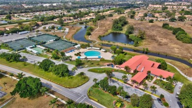 Wonderful 1st floor corner unit with parking right in front for on Villa Del Ray Golf Club in Florida - for sale on GolfHomes.com, golf home, golf lot