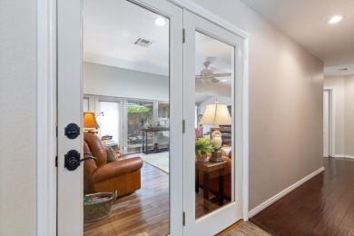 Surrounded by mature trees on a peaceful lot, this home blends on The Coves Golf Course in Oklahoma - for sale on GolfHomes.com, golf home, golf lot