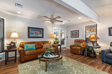 Surrounded by mature trees on a peaceful lot, this home blends on The Coves Golf Course in Oklahoma - for sale on GolfHomes.com, golf home, golf lot