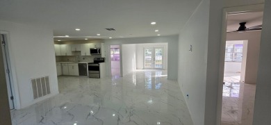 Step into luxury! This fully remodeled 4-bed, 2-bath stunner on Forest Oaks Golf Club in Florida - for sale on GolfHomes.com, golf home, golf lot