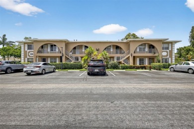 Wonderful 1st floor corner unit with parking right in front for on Villa Del Ray Golf Club in Florida - for sale on GolfHomes.com, golf home, golf lot
