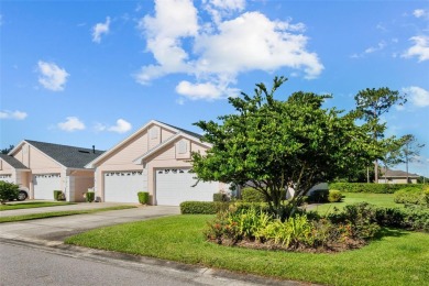 Welcome to this FULLY FURNISHED, END UNIT meticulously on Cypresswood Golf and Country Club in Florida - for sale on GolfHomes.com, golf home, golf lot