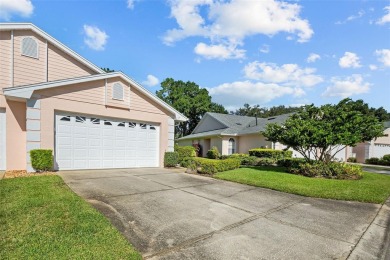 Welcome to this FULLY FURNISHED, END UNIT meticulously on Cypresswood Golf and Country Club in Florida - for sale on GolfHomes.com, golf home, golf lot