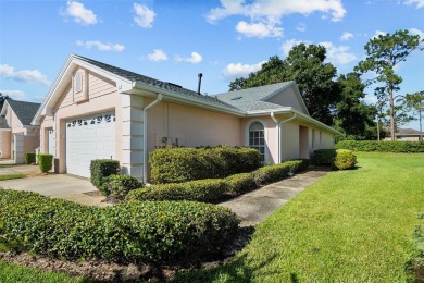 Welcome to this FULLY FURNISHED, END UNIT meticulously on Cypresswood Golf and Country Club in Florida - for sale on GolfHomes.com, golf home, golf lot