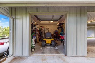 Surrounded by mature trees on a peaceful lot, this home blends on The Coves Golf Course in Oklahoma - for sale on GolfHomes.com, golf home, golf lot