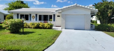 Discover refined living in Leisureville, Boynton Beach's premier on Leisureville Community Golf Course in Florida - for sale on GolfHomes.com, golf home, golf lot