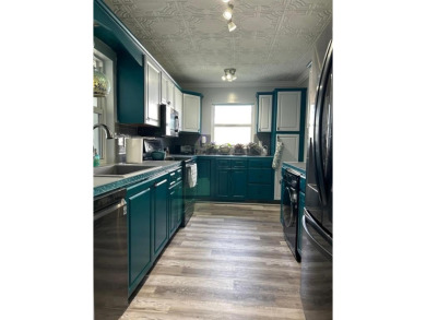 Discover refined living in Leisureville, Boynton Beach's premier on Leisureville Community Golf Course in Florida - for sale on GolfHomes.com, golf home, golf lot