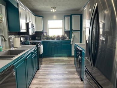 Discover refined living in Leisureville, Boynton Beach's premier on Leisureville Community Golf Course in Florida - for sale on GolfHomes.com, golf home, golf lot