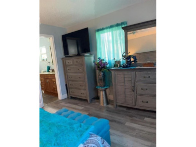 Discover refined living in Leisureville, Boynton Beach's premier on Leisureville Community Golf Course in Florida - for sale on GolfHomes.com, golf home, golf lot