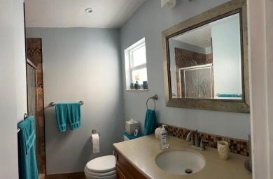 Discover refined living in Leisureville, Boynton Beach's premier on Leisureville Community Golf Course in Florida - for sale on GolfHomes.com, golf home, golf lot