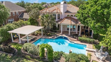 Welcome to this stunning Mediterranean-inspired retreat located on Hackberry Creek Country Club in Texas - for sale on GolfHomes.com, golf home, golf lot