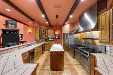 Welcome to this stunning Mediterranean-inspired retreat located on Hackberry Creek Country Club in Texas - for sale on GolfHomes.com, golf home, golf lot