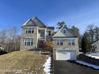 This Colonial is over 4000 square feet and located on the golf on Country Club of the Poconos Golf Course in Pennsylvania - for sale on GolfHomes.com, golf home, golf lot