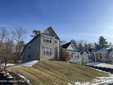 This Colonial is over 4000 square feet and located on the golf on Country Club of the Poconos Golf Course in Pennsylvania - for sale on GolfHomes.com, golf home, golf lot