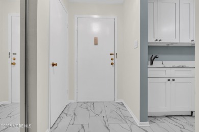 Beautifully Renovated upper level 1-bedroom 1 bath with enclosed on Pine Brook Golf Course in New Jersey - for sale on GolfHomes.com, golf home, golf lot