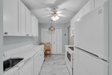 Beautifully Renovated upper level 1-bedroom 1 bath with enclosed on Pine Brook Golf Course in New Jersey - for sale on GolfHomes.com, golf home, golf lot