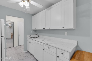 Beautifully Renovated upper level 1-bedroom 1 bath with enclosed on Pine Brook Golf Course in New Jersey - for sale on GolfHomes.com, golf home, golf lot