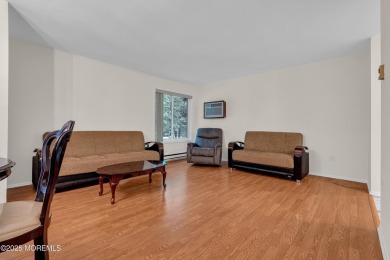 Beautifully Renovated upper level 1-bedroom 1 bath with enclosed on Pine Brook Golf Course in New Jersey - for sale on GolfHomes.com, golf home, golf lot