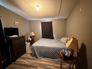 Welcome to 4021 Saponac Drive, where peaceful living meets on Lake Tansi Village Country Club in Tennessee - for sale on GolfHomes.com, golf home, golf lot