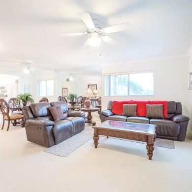 Spacious, sunlit 2-bed, 2-bath corner condo in the sought-after on Flamingo Lakes Country Club in Florida - for sale on GolfHomes.com, golf home, golf lot