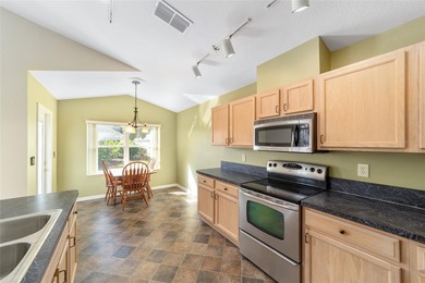 This rare Ocala model on a fully maintained lot lets you spend on Royal Oaks Golf Club in Florida - for sale on GolfHomes.com, golf home, golf lot