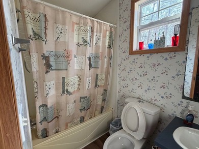 Welcome to 4021 Saponac Drive, where peaceful living meets on Lake Tansi Village Country Club in Tennessee - for sale on GolfHomes.com, golf home, golf lot