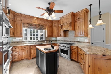 This beautiful all-brick traditional home is situated on a on The Dunes Golf and Beach Club in South Carolina - for sale on GolfHomes.com, golf home, golf lot