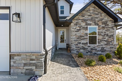 Experience comfort and style in this exceptionally maintained on Toqua Golf Course - Loudon County in Tennessee - for sale on GolfHomes.com, golf home, golf lot