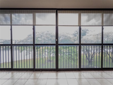 Spacious, sunlit 2-bed, 2-bath corner condo in the sought-after on Flamingo Lakes Country Club in Florida - for sale on GolfHomes.com, golf home, golf lot