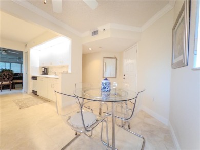 Spacious, sunlit 2-bed, 2-bath corner condo in the sought-after on Flamingo Lakes Country Club in Florida - for sale on GolfHomes.com, golf home, golf lot