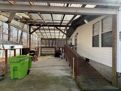 Welcome to 4021 Saponac Drive, where peaceful living meets on Lake Tansi Village Country Club in Tennessee - for sale on GolfHomes.com, golf home, golf lot